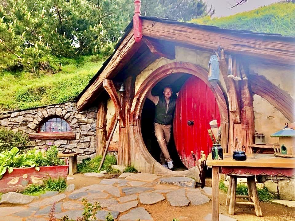 Man opening Hobbiton door