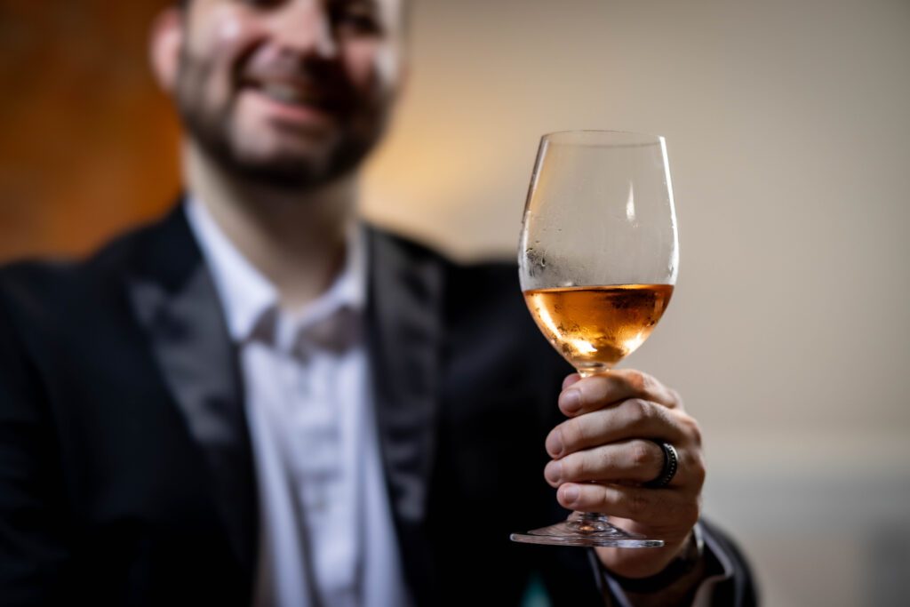 Cheers with a bubbly rose