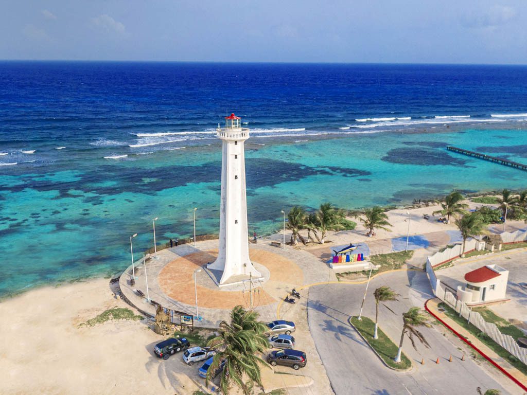 Mahahual lighthouse and colorful wooden houses