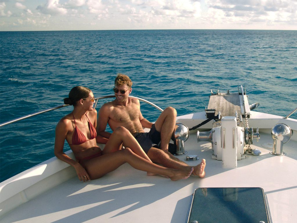 Couple on catamaran