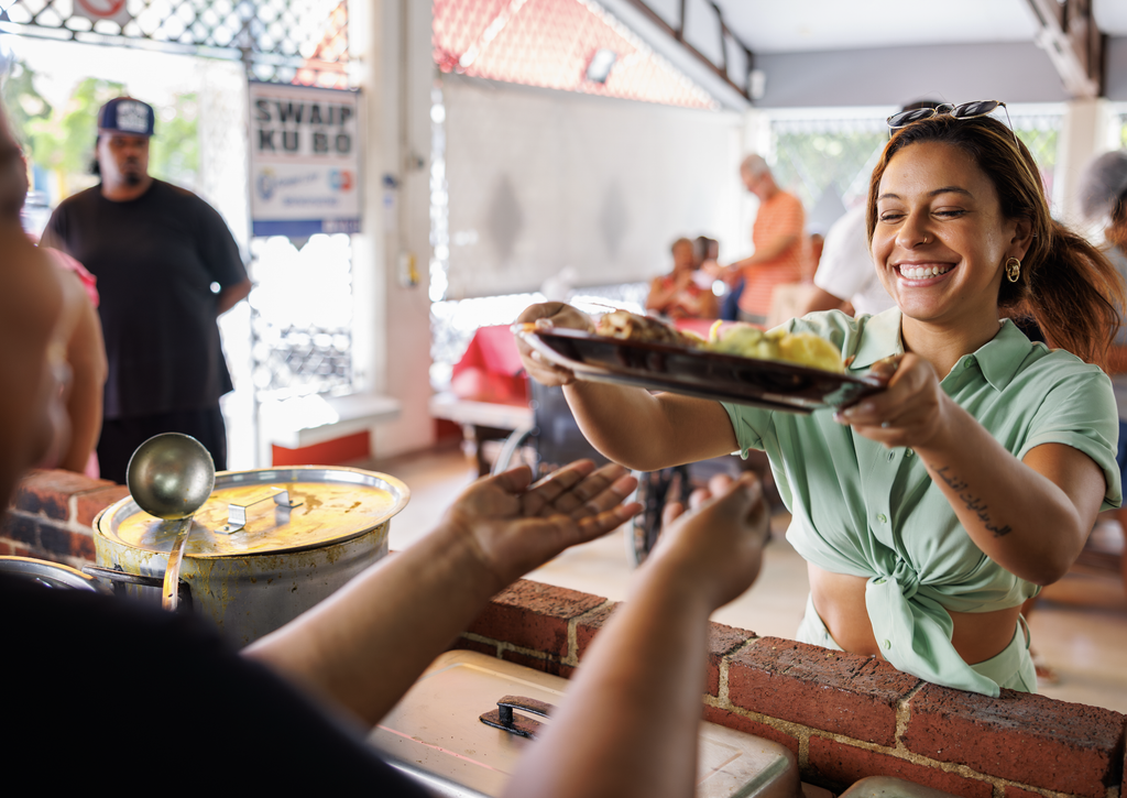 Receiving food in Curacao